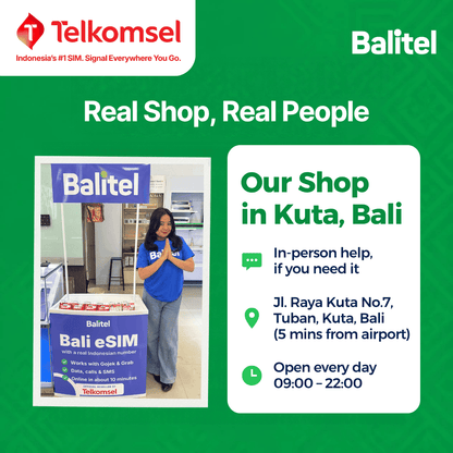 Balitel's real shop in Kuta, Bali: a Balitel staff member at the Balitel Bali eSIM counter at Jl. Raya Kuta No.7, Tuban, Kuta, 5 minutes from Bali airport. Open every day 09:00–22:00 for in-person eSIM help.